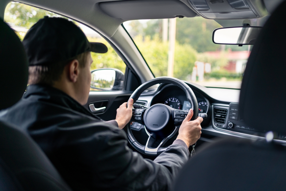 Driver&rsquo;s view from inside a vehicle highlighting pedestrian accident risk