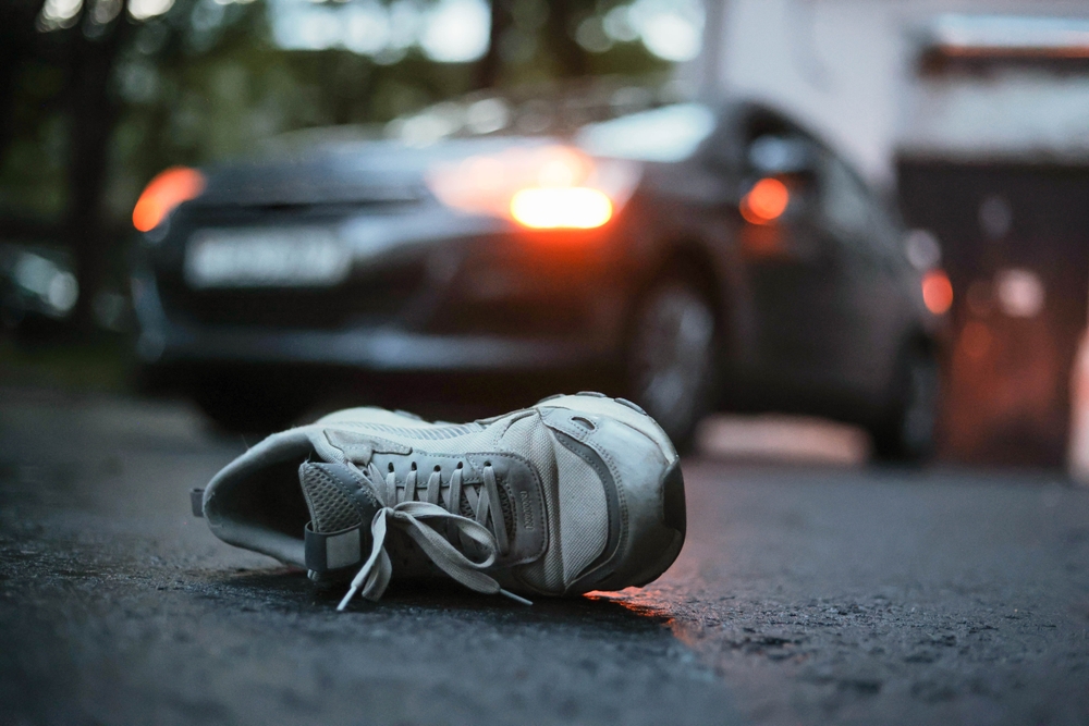 Shoe left on roadway after a pedestrian accident involving a vehicle in Georgia