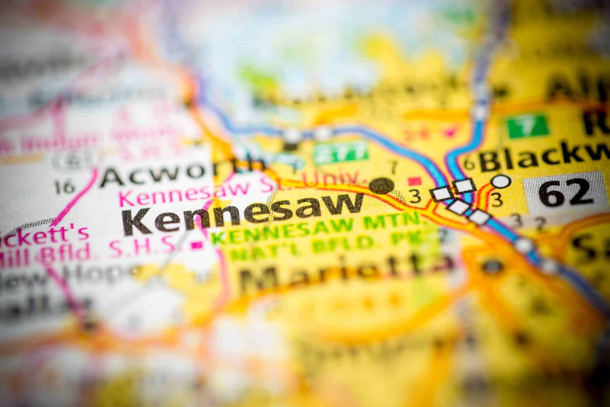 Brightly colored blurry view of a detailed map, with everything with only the word Kennesaw in focus.