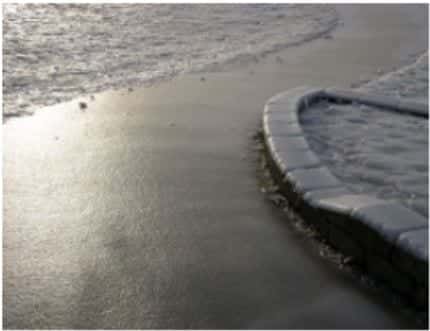 A curved icy covered walking path.