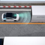 An arial view of a 3D model scene of a small white car with a black roof and blue radar beaming from the front of a self-driving car driving on a two lane highway behind a tractor trailer.