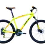 A yellow bycicle with a black seat, handlebars and wheels.