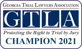 A badge from the Georgia Trial Lawyers Associates (GTLA) for the 2021 Champion.
