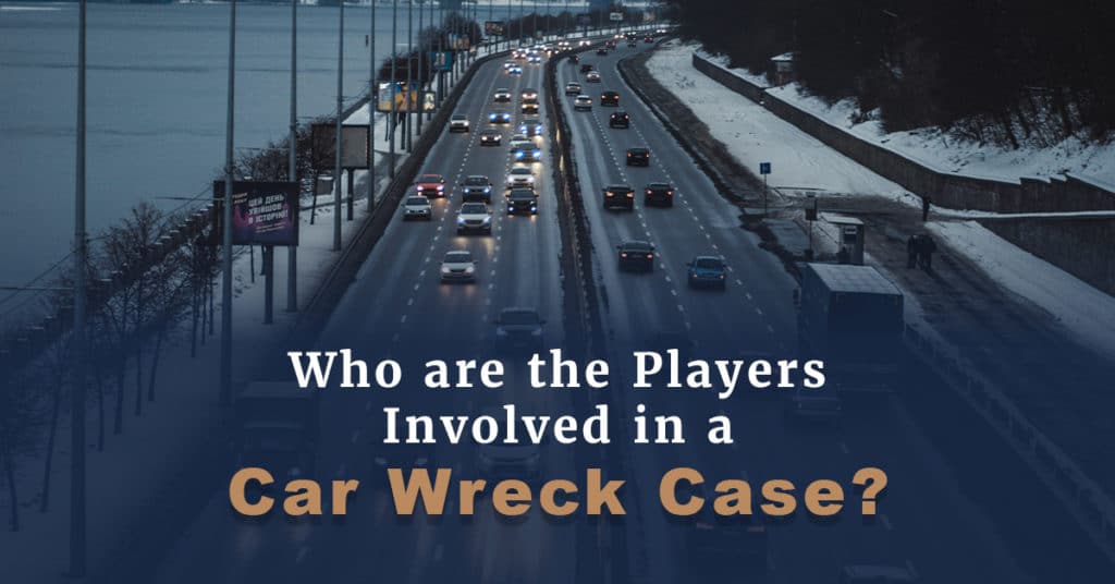 Traffic on a multi-lane highway with the question Who are the Players Invovled in a Car Wreck Case printed at the bottom of the picture.