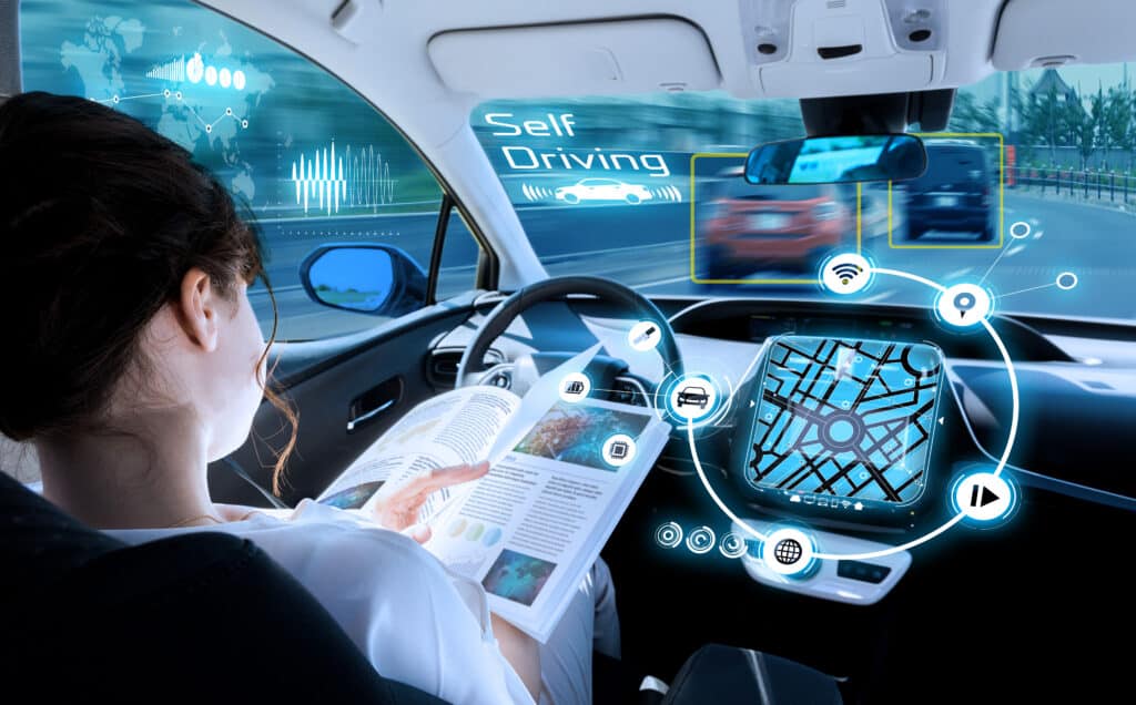 young woman reading a magazine in a autonomous car. driverless car. self-driving vehicle. heads up display. automotive technology.