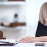 Insurance agent explaining refusal to pay compensation to accident victim, showing denial of insurance claim.